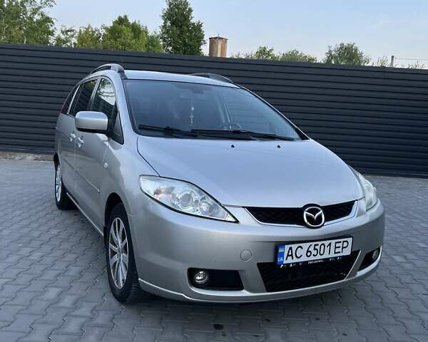 Серый Мазда 5, объемом двигателя 2 л и пробегом 206 тыс. км за 4800 $, фото 1 на Automoto.ua