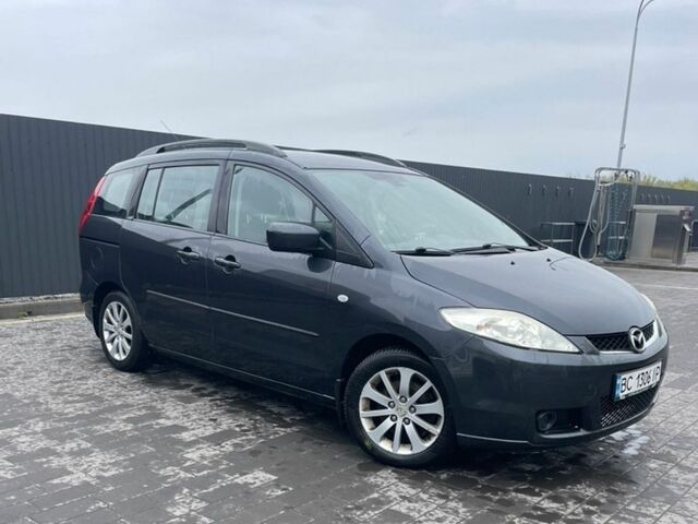 Серый Мазда 5, объемом двигателя 2 л и пробегом 279 тыс. км за 3900 $, фото 1 на Automoto.ua
