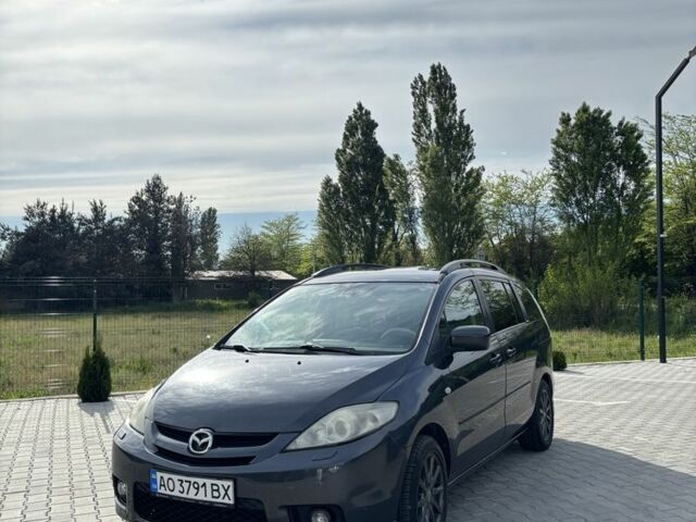Серый Мазда 5, объемом двигателя 2 л и пробегом 376 тыс. км за 4700 $, фото 1 на Automoto.ua