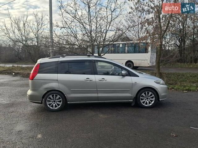 Серый Мазда 5, объемом двигателя 2 л и пробегом 150 тыс. км за 2999 $, фото 1 на Automoto.ua