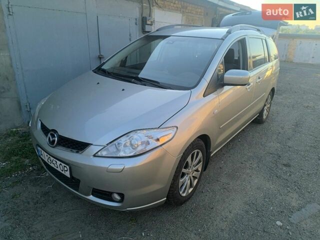 Серый Мазда 5, объемом двигателя 2 л и пробегом 200 тыс. км за 4700 $, фото 1 на Automoto.ua