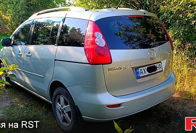 Серый Мазда 5, объемом двигателя 2 л и пробегом 297 тыс. км за 6000 $, фото 1 на Automoto.ua