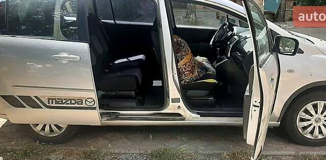 Серый Мазда 5, объемом двигателя 2 л и пробегом 285 тыс. км за 4500 $, фото 1 на Automoto.ua