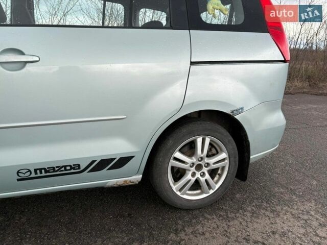 Серый Мазда 5, объемом двигателя 2 л и пробегом 260 тыс. км за 4700 $, фото 1 на Automoto.ua
