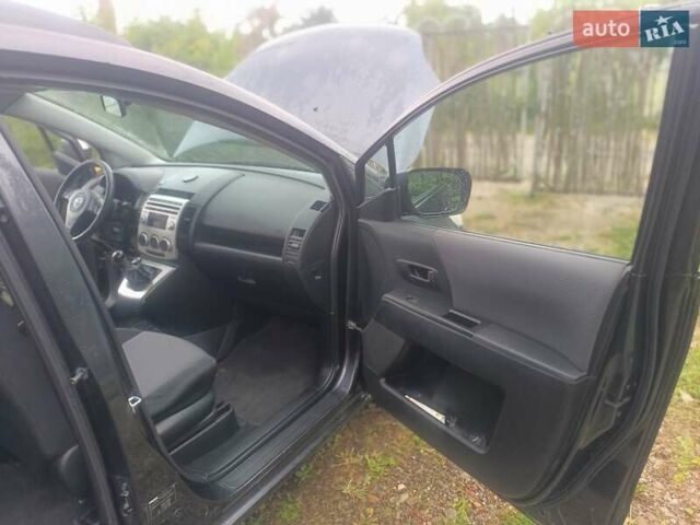 Серый Мазда 5, объемом двигателя 2 л и пробегом 317 тыс. км за 5500 $, фото 1 на Automoto.ua