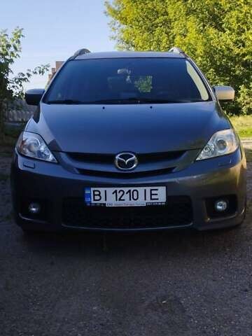Серый Мазда 5, объемом двигателя 2 л и пробегом 226 тыс. км за 5600 $, фото 1 на Automoto.ua