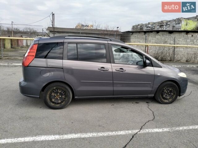 Серый Мазда 5, объемом двигателя 2 л и пробегом 268 тыс. км за 5500 $, фото 1 на Automoto.ua