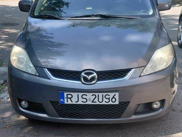 Серый Мазда 5, объемом двигателя 2 л и пробегом 326 тыс. км за 4996 $, фото 1 на Automoto.ua