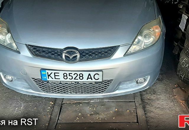 Серый Мазда 5, объемом двигателя 2 л и пробегом 290 тыс. км за 4000 $, фото 1 на Automoto.ua