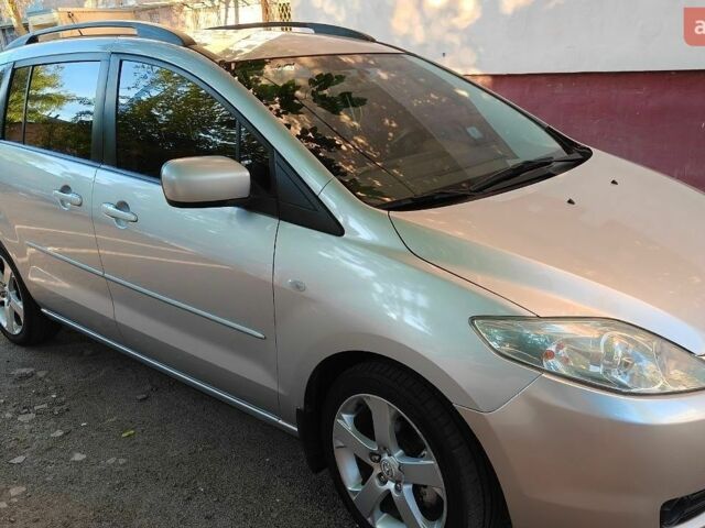 Серый Мазда 5, объемом двигателя 2 л и пробегом 205 тыс. км за 5800 $, фото 1 на Automoto.ua