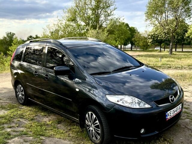 Серый Мазда 5, объемом двигателя 1.8 л и пробегом 255 тыс. км за 5450 $, фото 1 на Automoto.ua