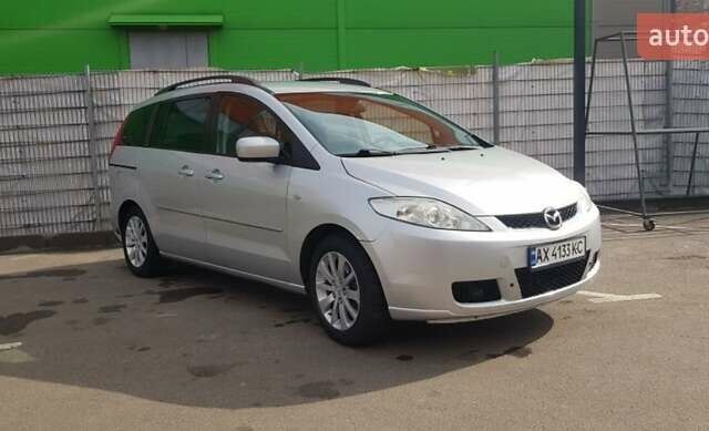 Серый Мазда 5, объемом двигателя 1.8 л и пробегом 247 тыс. км за 4999 $, фото 1 на Automoto.ua