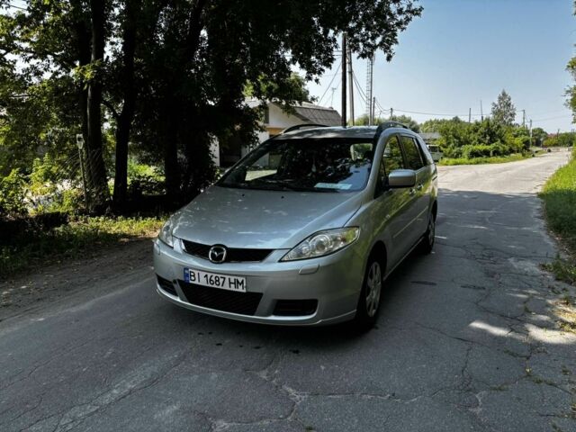 Серый Мазда 5, объемом двигателя 1.8 л и пробегом 321 тыс. км за 4499 $, фото 1 на Automoto.ua