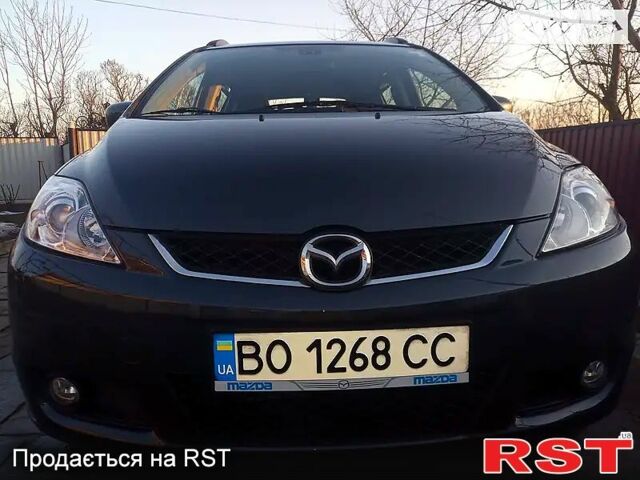 Серый Мазда 5, объемом двигателя 2 л и пробегом 180 тыс. км за 3800 $, фото 1 на Automoto.ua