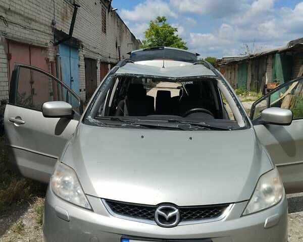 Серый Мазда 5, объемом двигателя 2 л и пробегом 297 тыс. км за 2500 $, фото 1 на Automoto.ua