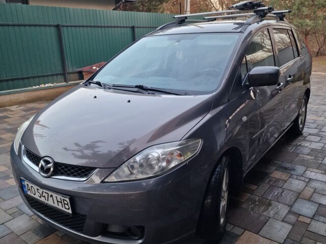Серый Мазда 5, объемом двигателя 2 л и пробегом 270 тыс. км за 4800 $, фото 1 на Automoto.ua