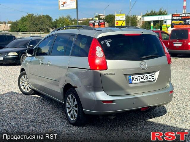 Серый Мазда 5, объемом двигателя 2 л и пробегом 260 тыс. км за 2699 $, фото 1 на Automoto.ua