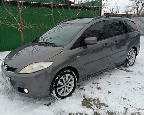 Серый Мазда 5, объемом двигателя 2 л и пробегом 302 тыс. км за 4700 $, фото 1 на Automoto.ua