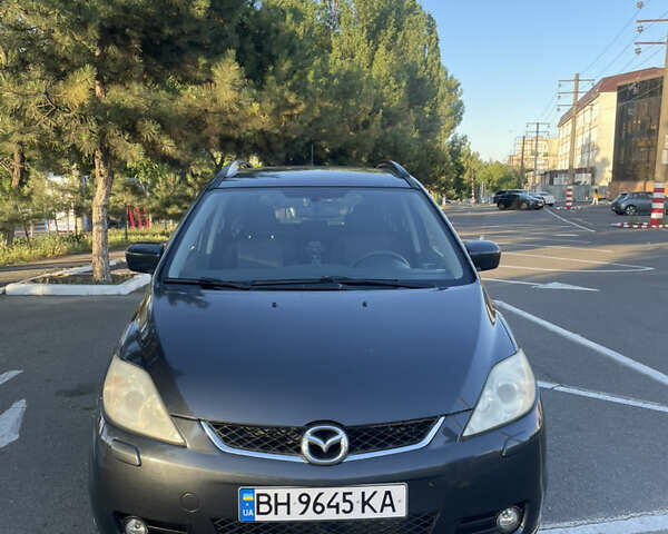 Серый Мазда 5, объемом двигателя 2 л и пробегом 246 тыс. км за 5400 $, фото 1 на Automoto.ua