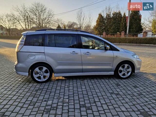 Серый Мазда 5, объемом двигателя 2 л и пробегом 200 тыс. км за 5400 $, фото 1 на Automoto.ua