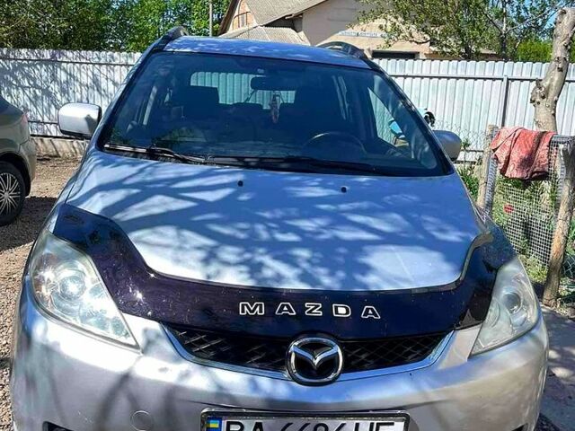 Серый Мазда 5, объемом двигателя 2 л и пробегом 264 тыс. км за 4799 $, фото 1 на Automoto.ua