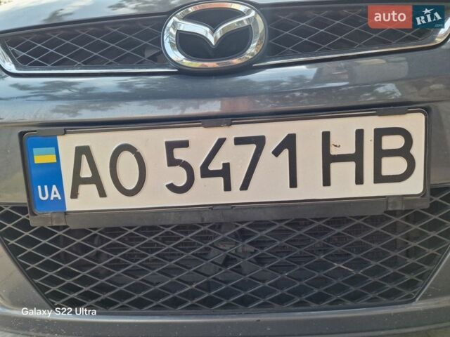 Серый Мазда 5, объемом двигателя 2 л и пробегом 270 тыс. км за 4100 $, фото 1 на Automoto.ua