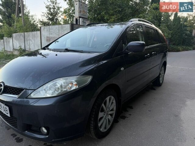 Серый Мазда 5, объемом двигателя 2 л и пробегом 394 тыс. км за 4000 $, фото 1 на Automoto.ua