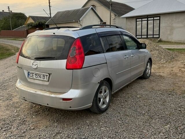 Серый Мазда 5, объемом двигателя 2 л и пробегом 229 тыс. км за 2900 $, фото 1 на Automoto.ua
