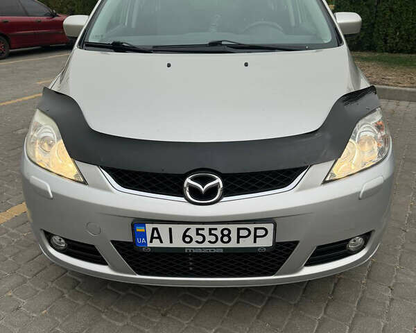 Серый Мазда 5, объемом двигателя 2 л и пробегом 210 тыс. км за 6800 $, фото 1 на Automoto.ua