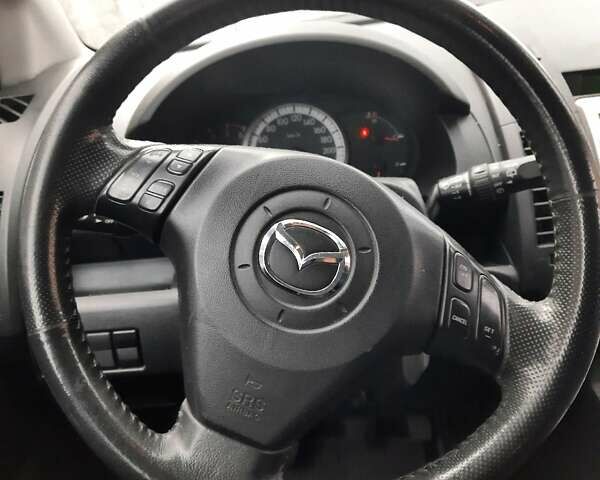 Серый Мазда 5, объемом двигателя 2 л и пробегом 295 тыс. км за 6900 $, фото 1 на Automoto.ua