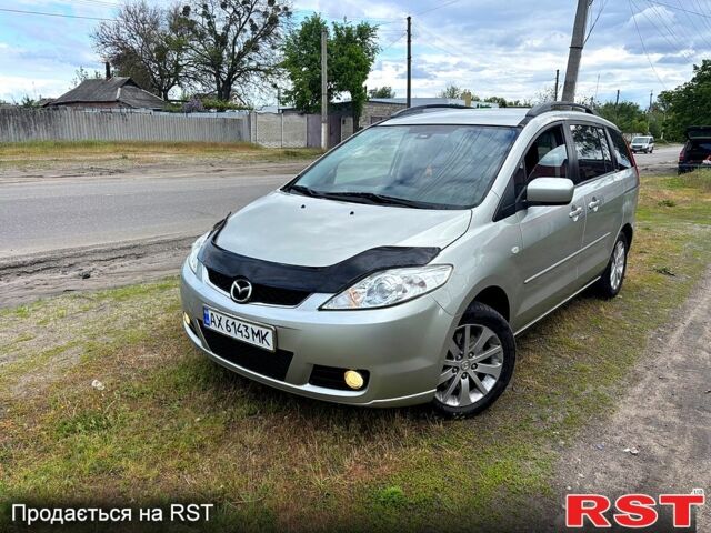 Серый Мазда 5, объемом двигателя 1.8 л и пробегом 222 тыс. км за 4550 $, фото 1 на Automoto.ua