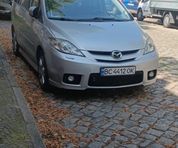 Серый Мазда 5, объемом двигателя 2 л и пробегом 336 тыс. км за 4739 $, фото 1 на Automoto.ua