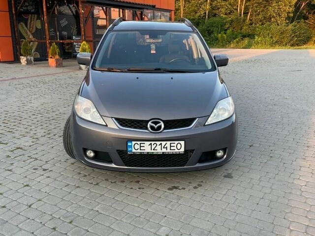 Серый Мазда 5, объемом двигателя 2 л и пробегом 318 тыс. км за 4400 $, фото 1 на Automoto.ua