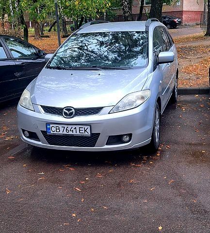 Серый Мазда 5, объемом двигателя 2 л и пробегом 280 тыс. км за 4990 $, фото 1 на Automoto.ua