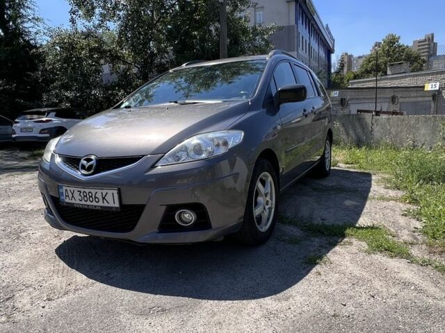 Серый Мазда 5, объемом двигателя 2 л и пробегом 335 тыс. км за 6500 $, фото 1 на Automoto.ua