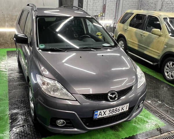 Серый Мазда 5, объемом двигателя 2 л и пробегом 331 тыс. км за 6800 $, фото 1 на Automoto.ua