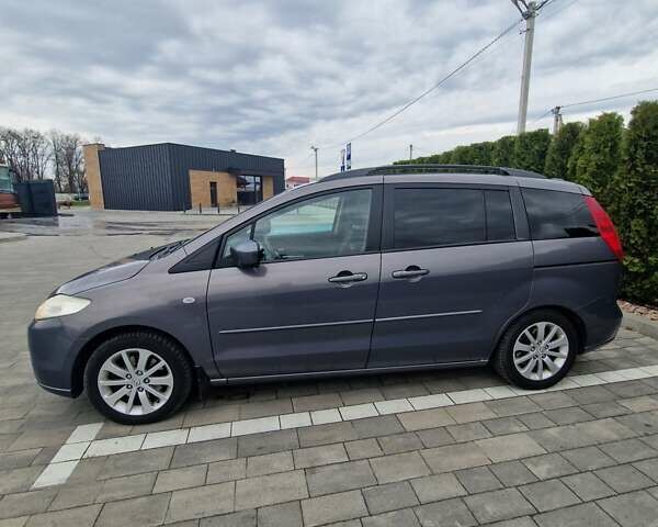 Серый Мазда 5, объемом двигателя 2 л и пробегом 332 тыс. км за 5200 $, фото 1 на Automoto.ua
