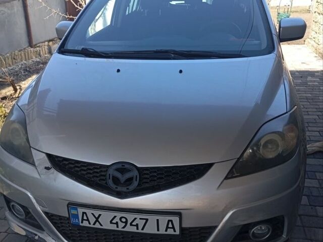 Серый Мазда 5, объемом двигателя 2 л и пробегом 299 тыс. км за 4500 $, фото 1 на Automoto.ua