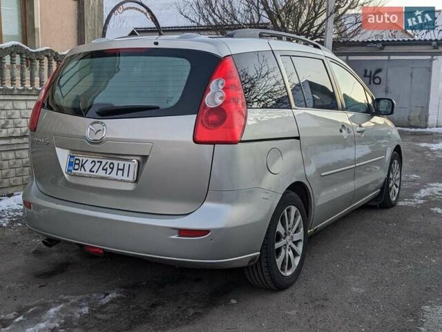 Серый Мазда 5, объемом двигателя 2 л и пробегом 390 тыс. км за 3500 $, фото 1 на Automoto.ua