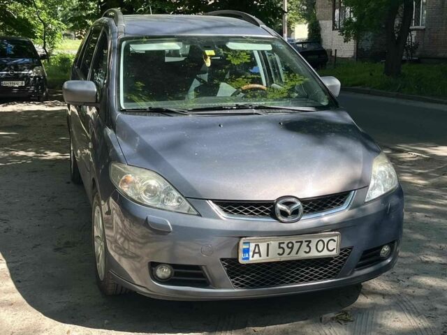 Серый Мазда 5, объемом двигателя 2 л и пробегом 15 тыс. км за 4216 $, фото 1 на Automoto.ua
