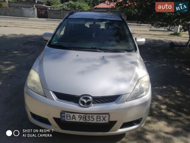 Серый Мазда 5, объемом двигателя 2 л и пробегом 169 тыс. км за 5300 $, фото 1 на Automoto.ua