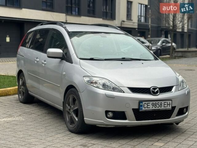 Серый Мазда 5, объемом двигателя 2 л и пробегом 378 тыс. км за 4950 $, фото 1 на Automoto.ua