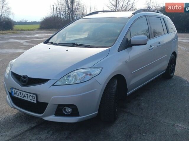 Серый Мазда 5, объемом двигателя 2 л и пробегом 206 тыс. км за 5600 $, фото 1 на Automoto.ua