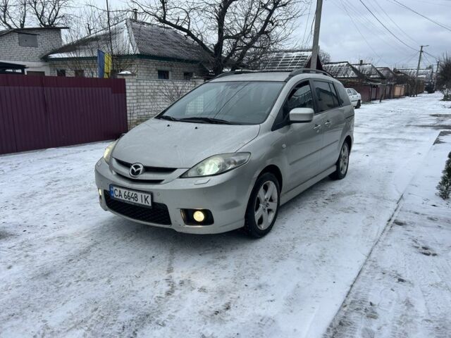 Серый Мазда 5, объемом двигателя 2 л и пробегом 231 тыс. км за 5350 $, фото 1 на Automoto.ua