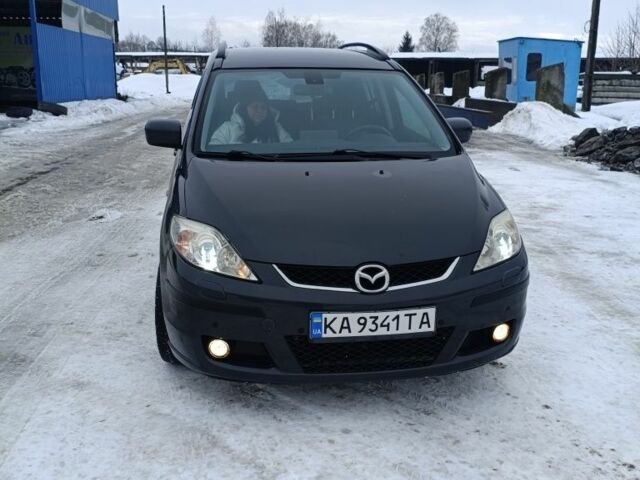 Серый Мазда 5, объемом двигателя 2 л и пробегом 235 тыс. км за 4150 $, фото 1 на Automoto.ua