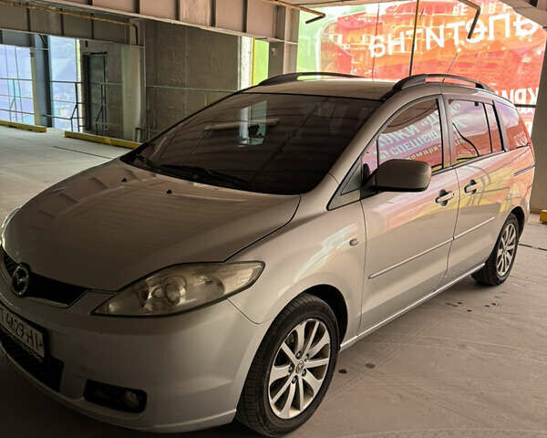 Серый Мазда 5, объемом двигателя 2 л и пробегом 336 тыс. км за 5800 $, фото 1 на Automoto.ua