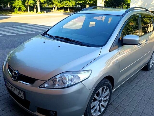 Серый Мазда 5, объемом двигателя 2 л и пробегом 296 тыс. км за 6500 $, фото 1 на Automoto.ua