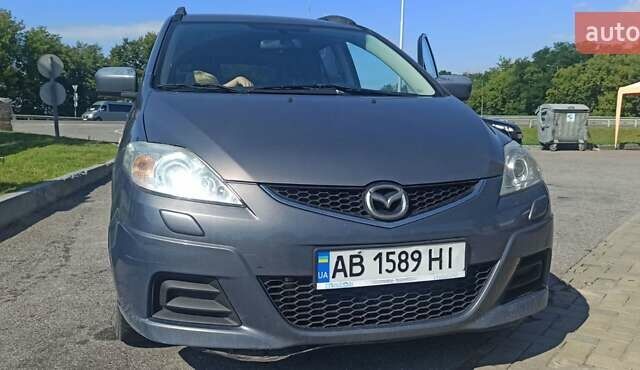 Серый Мазда 5, объемом двигателя 2 л и пробегом 208 тыс. км за 6000 $, фото 1 на Automoto.ua