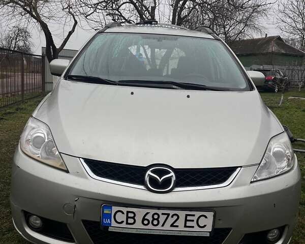 Серый Мазда 5, объемом двигателя 2 л и пробегом 414 тыс. км за 3700 $, фото 1 на Automoto.ua