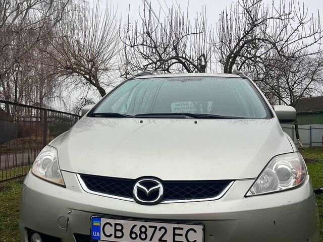 Серый Мазда 5, объемом двигателя 2 л и пробегом 414 тыс. км за 3700 $, фото 1 на Automoto.ua